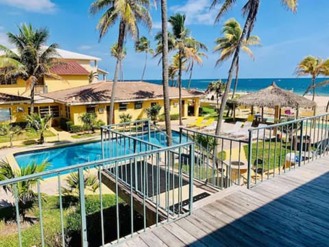 Standard Room, 1 Queen Bed, Garden View | Beach | Private beach