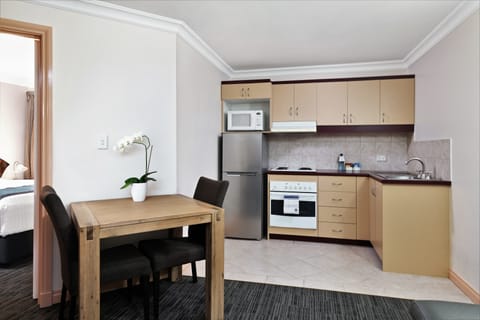 One Bedroom Apartment | Private kitchen | Microwave, oven, stovetop, electric kettle