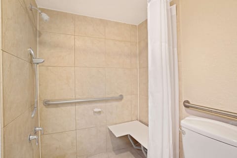 Room, 1 Double Bed, Accessible, Non Smoking (Mobility) | Bathroom | Combined shower/tub, deep soaking tub, free toiletries, towels