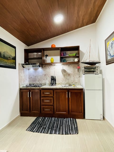 Premier Room, 1 Bedroom, Garden View | Private kitchen | Dining tables