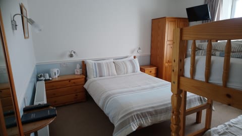 Family Quadruple Room, Multiple Beds, Non Smoking | Iron/ironing board, free WiFi, bed sheets