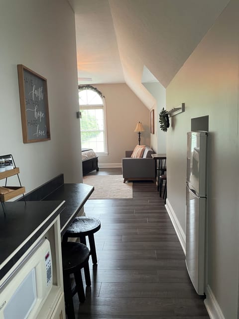 You will enter in through the kitchen. Kitchen has a small apt. Refrigerator