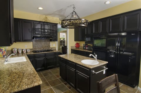 View of Kitchen Adjacent to Formal Separate Dining Room with Seating for 6!