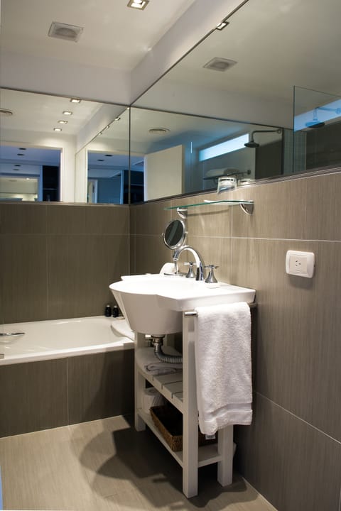 Superior Room | Bathroom | Combined shower/tub, deep soaking tub, rainfall showerhead