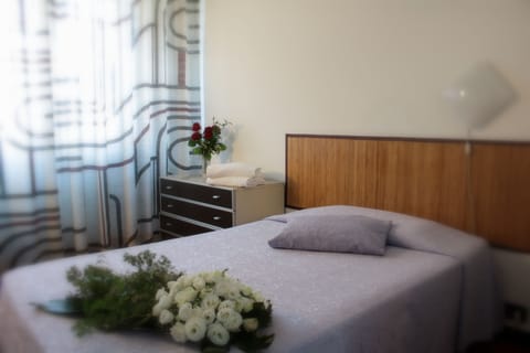 Basic Single Room, 1 Twin Bed, Private Bathroom | Desk, blackout drapes, free WiFi, bed sheets