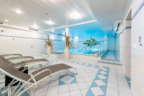 Indoor pool, open 4:00 PM to 10:00 PM, sun loungers