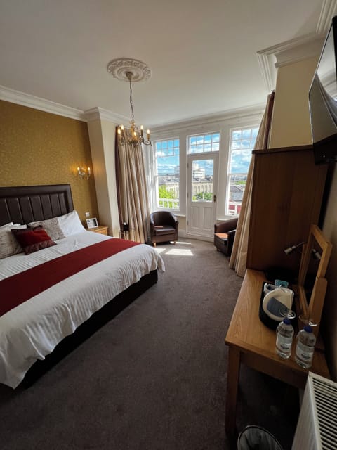 Deluxe Double Room, Balcony | Desk, iron/ironing board, free WiFi, bed sheets