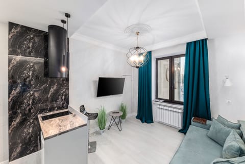 Design Apartment (Sverdlova Street 24) | Private kitchen | Fridge, microwave, stovetop, coffee/tea maker