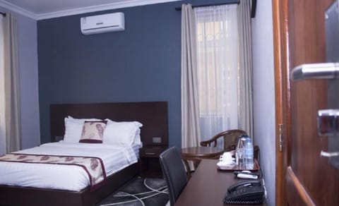 Premium Suite, 1 Bedroom, City View | Premium bedding, desk, soundproofing, free WiFi