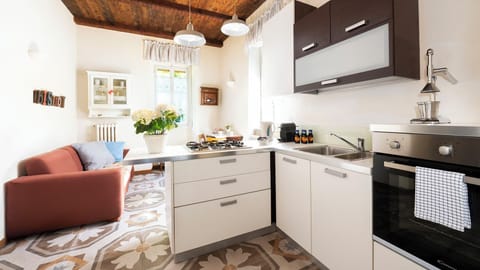 Suite, 2 Bedrooms | Private kitchen | Full-size fridge, oven, stovetop, espresso maker