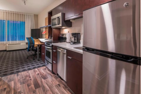 Suite, 1 Bedroom | Private kitchen | Fridge, microwave, stovetop, dishwasher