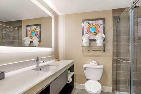 Suite, Multiple Beds, Refrigerator & Microwave (with Sofabed) | Bathroom | Combined shower/tub, free toiletries, hair dryer, towels