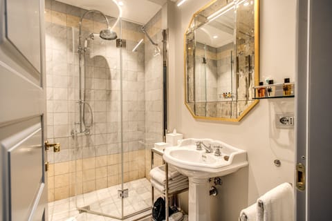 Superior Room | Bathroom | Designer toiletries, hair dryer, bathrobes, slippers