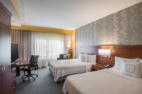 Room, 2 Queen Beds | Hypo-allergenic bedding, pillowtop beds, in-room safe, desk
