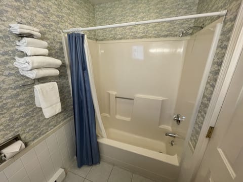 Room, 2 Double Beds | Bathroom | Combined shower/tub, free toiletries, hair dryer, towels