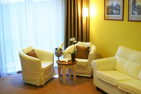 Junior Apartment | Living area | 25-cm LCD TV with satellite channels, TV