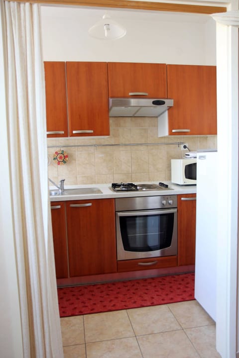 Standard Apartment, 2 Bedrooms, Balcony | Private kitchen | Fridge, coffee/tea maker, electric kettle, toaster