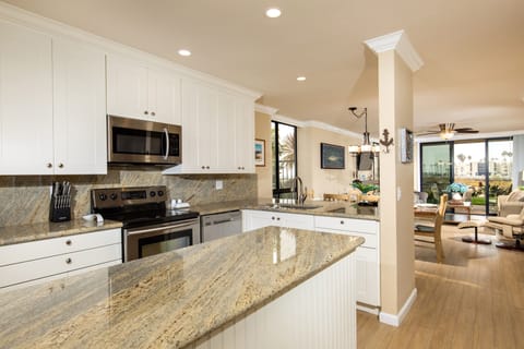 Kitchen - The kitchen has a large island and plenty of storage space.