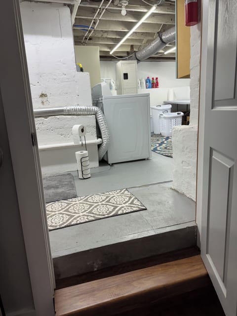 Entrance to Half Bath and Laundry Room