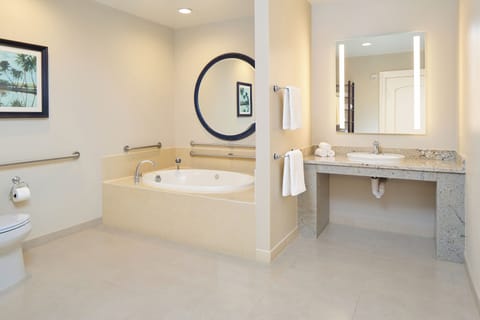 Designer toiletries, hair dryer, towels, shampoo