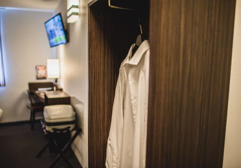 Desk, soundproofing, iron/ironing board, free cribs/infant beds