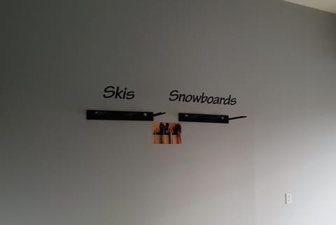 Ski/Snowboard racks in Heated Garage & boot/glove dryers.