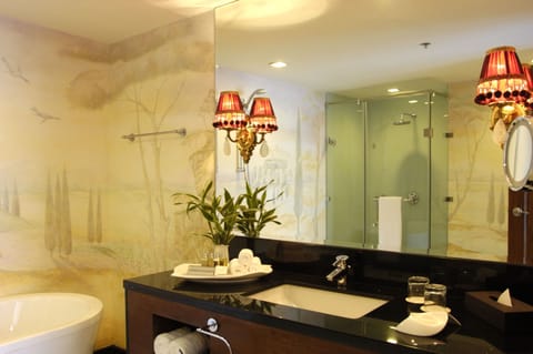 Suite, 1 King Bed | Bathroom | Shower, designer toiletries, hair dryer, bathrobes
