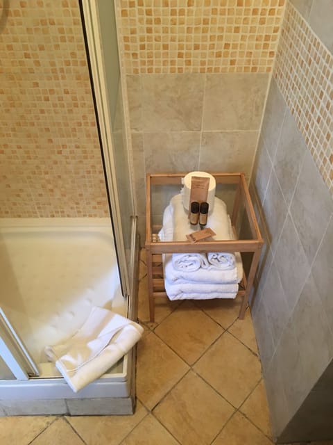 Shower, eco-friendly toiletries, hair dryer, bidet