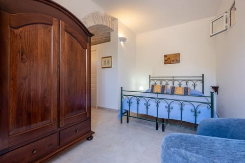 Family Apartment, Garden View (Il Melograno) | 1 bedroom, premium bedding, iron/ironing board, free cribs/infant beds