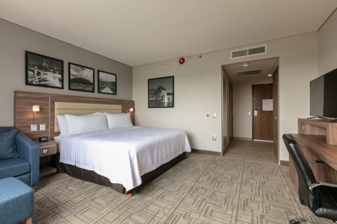 Room, 1 King Bed, Accessible (Mobility & Hearing, Roll-in Shower) | In-room safe, desk, iron/ironing board, free WiFi
