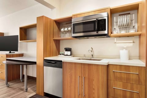 Studio Suite, 1 King Bed | Private kitchen | Full-size fridge, microwave, dishwasher, coffee/tea maker