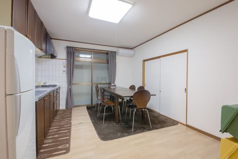 Japanese Style Townhouse | Private kitchen | Fridge, microwave, stovetop, electric kettle