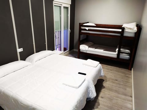 Quadruple room (2 beds, 1 bunk bed) | Free WiFi, bed sheets