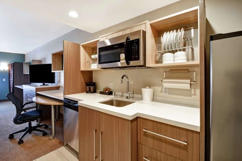 Desk, blackout drapes, iron/ironing board, free cribs/infant beds