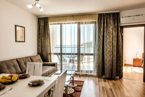 Apartment, 1 Bedroom, Sea View | 1 bedroom, in-room safe, soundproofing, free WiFi