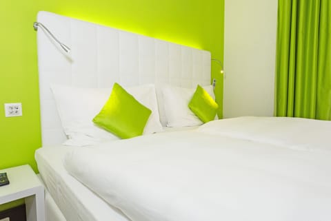 Premium bedding, down comforters, in-room safe, desk