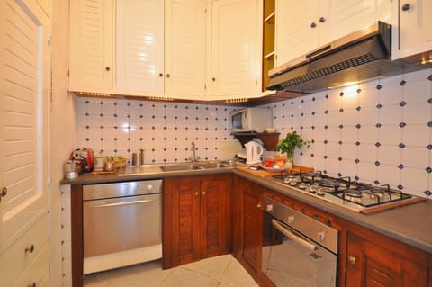 Villa, 2 Bedrooms | Private kitchen | Full-size fridge, microwave, oven, stovetop