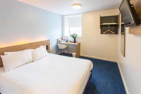 Double Room, City View | Desk, free WiFi, bed sheets, wheelchair access