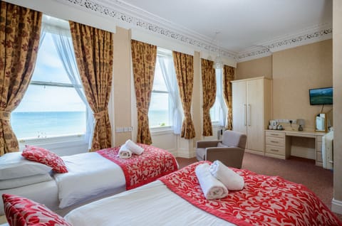 Twin Room, Sea View | Iron/ironing board, bed sheets