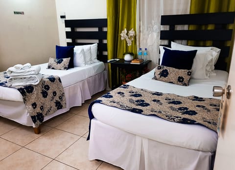 Economy Twin Room | 1 bedroom, premium bedding, iron/ironing board, free WiFi