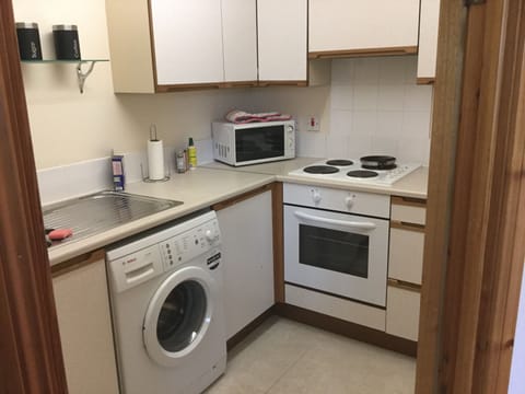 Apartment | Private kitchenette | Full-size fridge, microwave, oven, stovetop