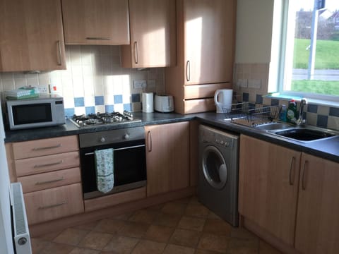 Apartment | Private kitchen | Full-size fridge, microwave, oven, stovetop