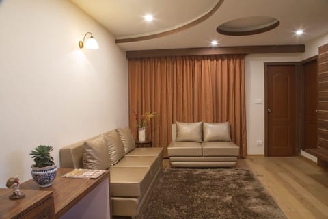 Superior Double Room, 1 King Bed | Living room | Flat-screen TV, fireplace