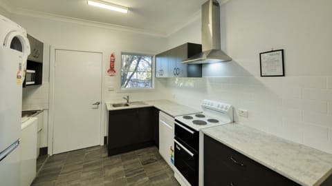 Deluxe Apartment, 1 Bedroom | Private kitchen | Fridge, microwave, coffee/tea maker, electric kettle