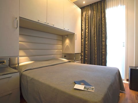 Double or Twin Room, Balcony | Minibar, in-room safe, desk, soundproofing