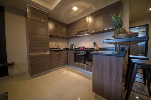 One Bedroom Suite | Private kitchen | Fridge, microwave, coffee/tea maker