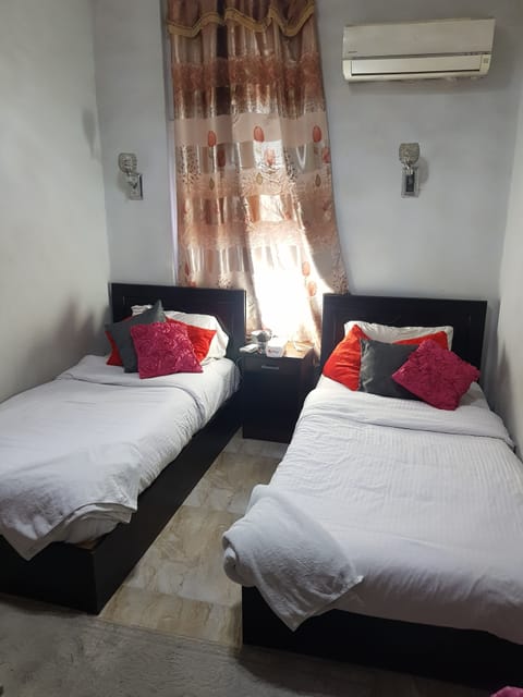 Twin Room, Private Bathroom | Iron/ironing board, free WiFi