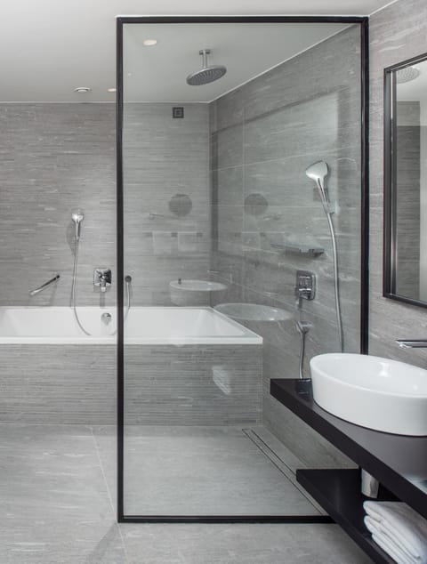 Junior Suite, Terrace, Sea View | Bathroom | Shower, designer toiletries, hair dryer, bathrobes