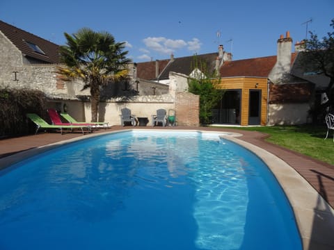 Seasonal outdoor pool, open 9:00 AM to 8 PM, pool umbrellas