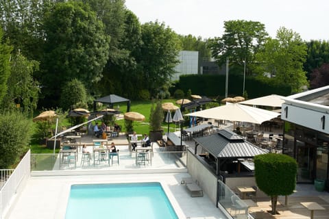 Seasonal outdoor pool, open 10 AM to 9 PM, sun loungers